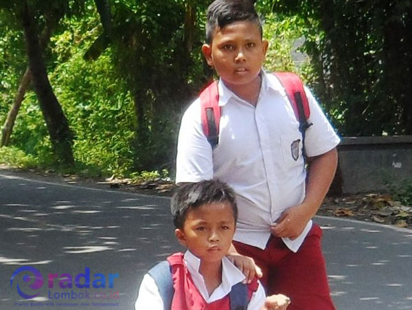 Masmuh, seorang difabel Berprestasi di Sekolah
