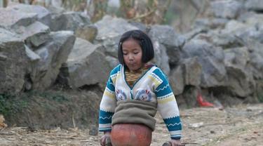 Qian Hongyan, Si Gadis Bola Basket yang Kini Menjadi Atlet Renang