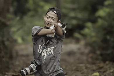 Achmad seorang Fotografer diafabel profesional