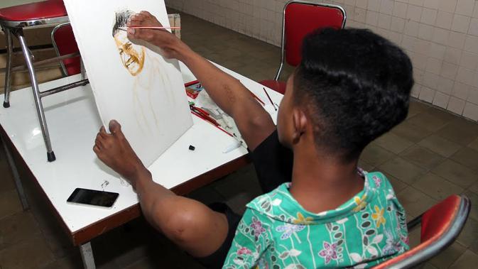 Muhammad Salwa Aristotel Pelukis Tanpa Lengan